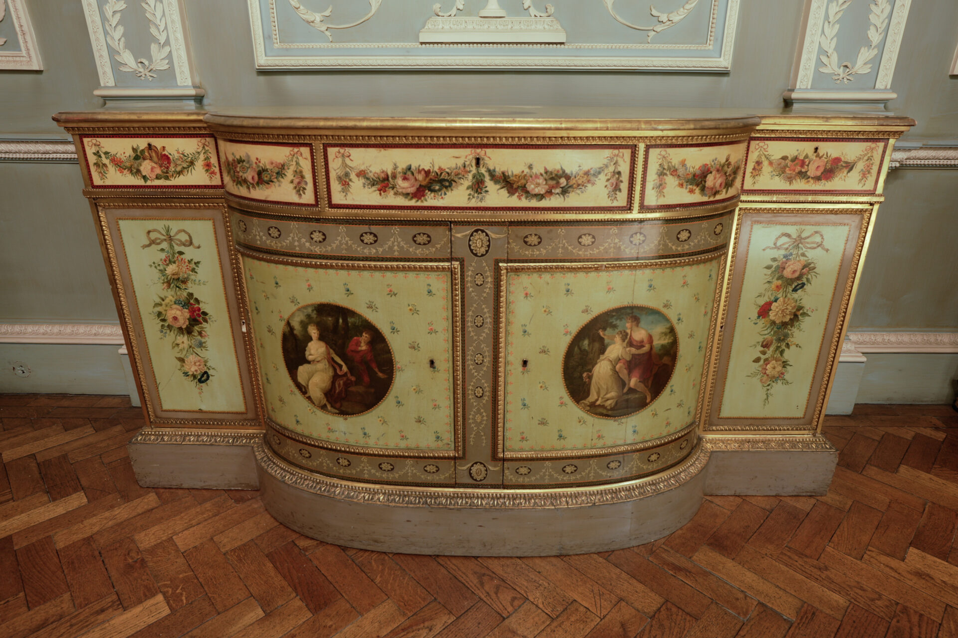 An antique painted cabinet.